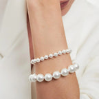 Pulseira Folheada a Ouro com Pérolas Shell e Fecho Imã