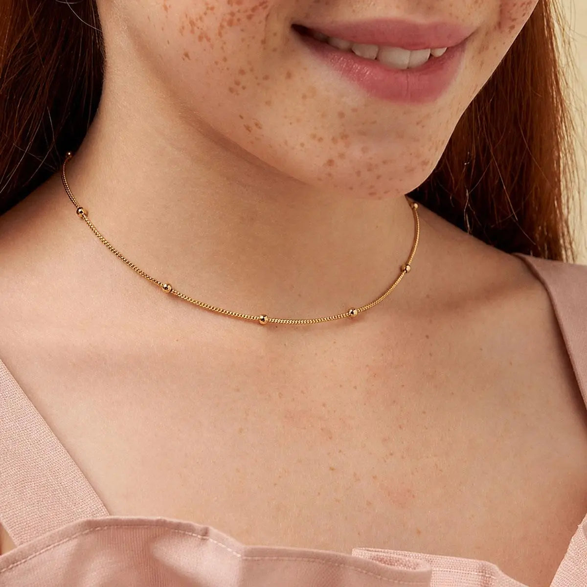 Colar Folheado a Ouro Kids com Esferas Dispersas Lisas
