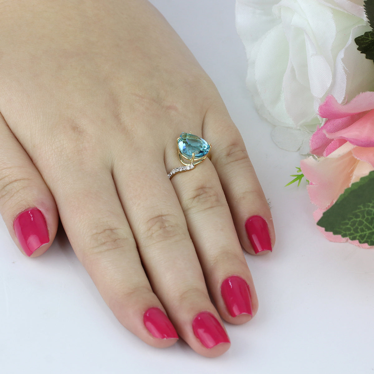 Anel Aro Desencontrado Gota Cristal Azul 10x12 mm Rodinado em Ouro 18K