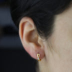 Brinco Argola Redonda Laço Vazado Cravejado 1 Zircônia em Ouro 18K
